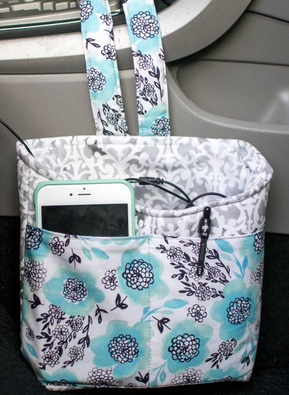 Keep your phone and other bits and pieces safe in the car with this CUTE bag!