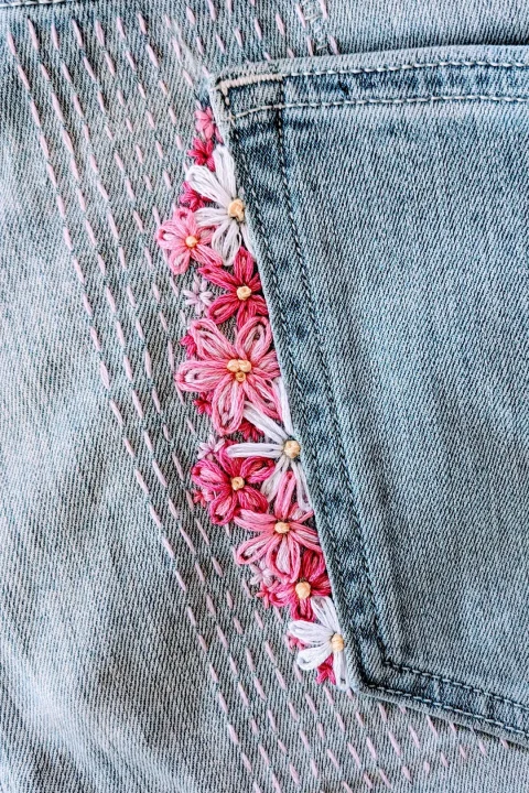 Discover 16 creative ways to patch and mend your jeans with denim embroidery and visible mending
