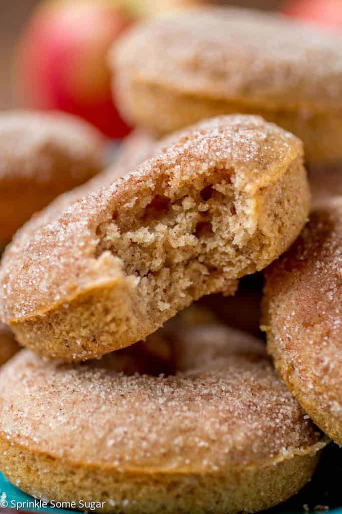 These baked apple cider donuts are full of the taste of Fall, and sprinkled with cinnamon spice sugar. Oh my!