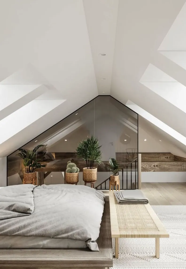 Modern Minimalist HavenClean lines and a monochrome palette make this attic bedroom a serene escape. Skylights enhance the space, while woven planters and a simple wooden bench bring natural elements into the sleek design.