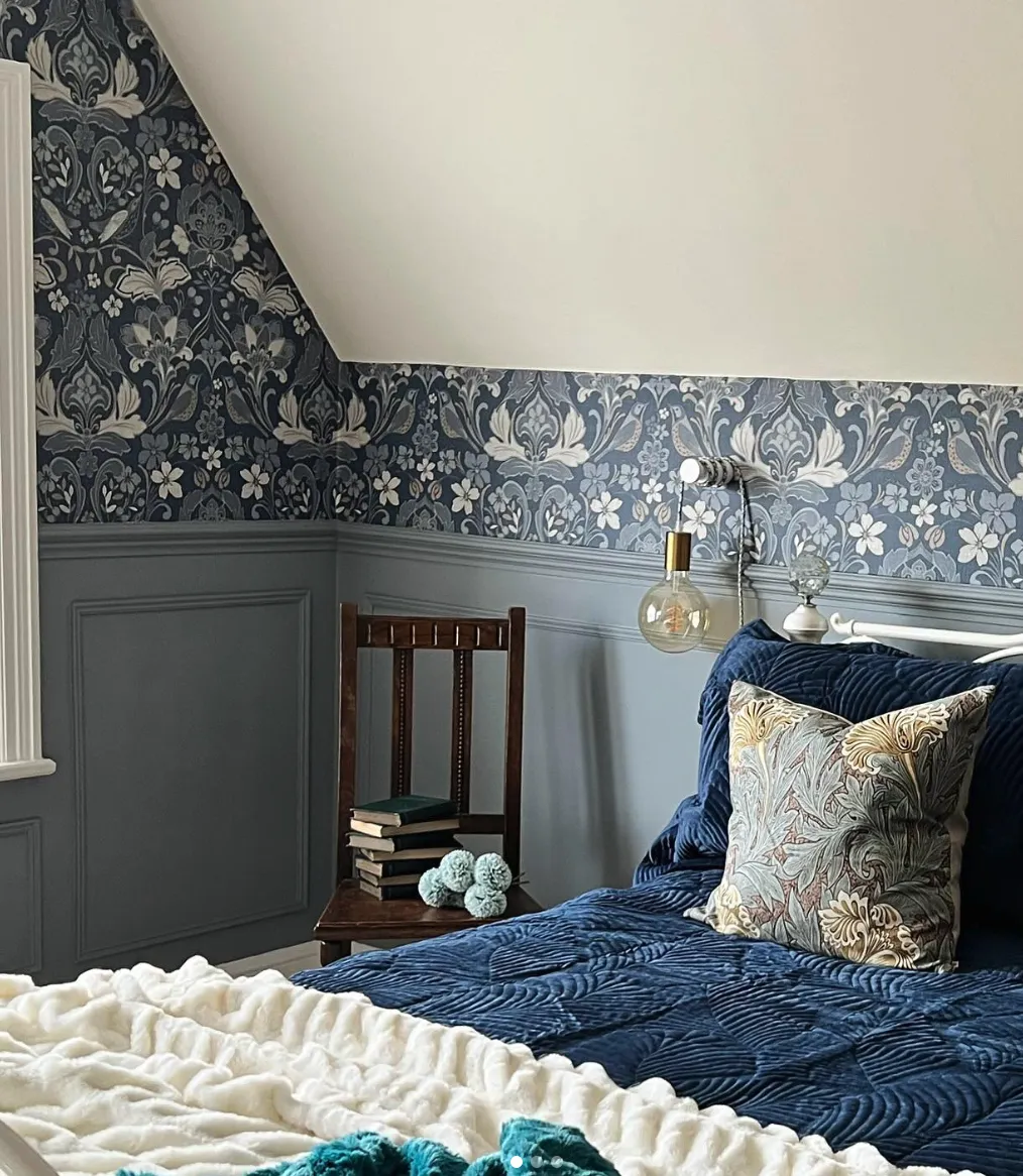 "Blue Elegance" – A mix of rich blues and classic patterns adds depth and sophistication. The half-wall wallpaper is a clever way to add character without overwhelming the space.