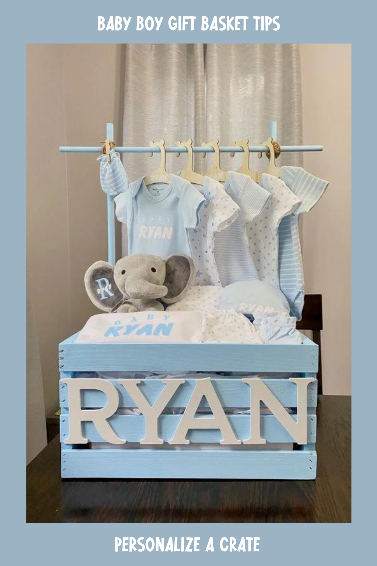 This baby boy gift box stands out with its custom name in bold letters! Filled with matching outfits, a plush elephant, and other goodies, it's a perfect present that doubles as nursery decor.