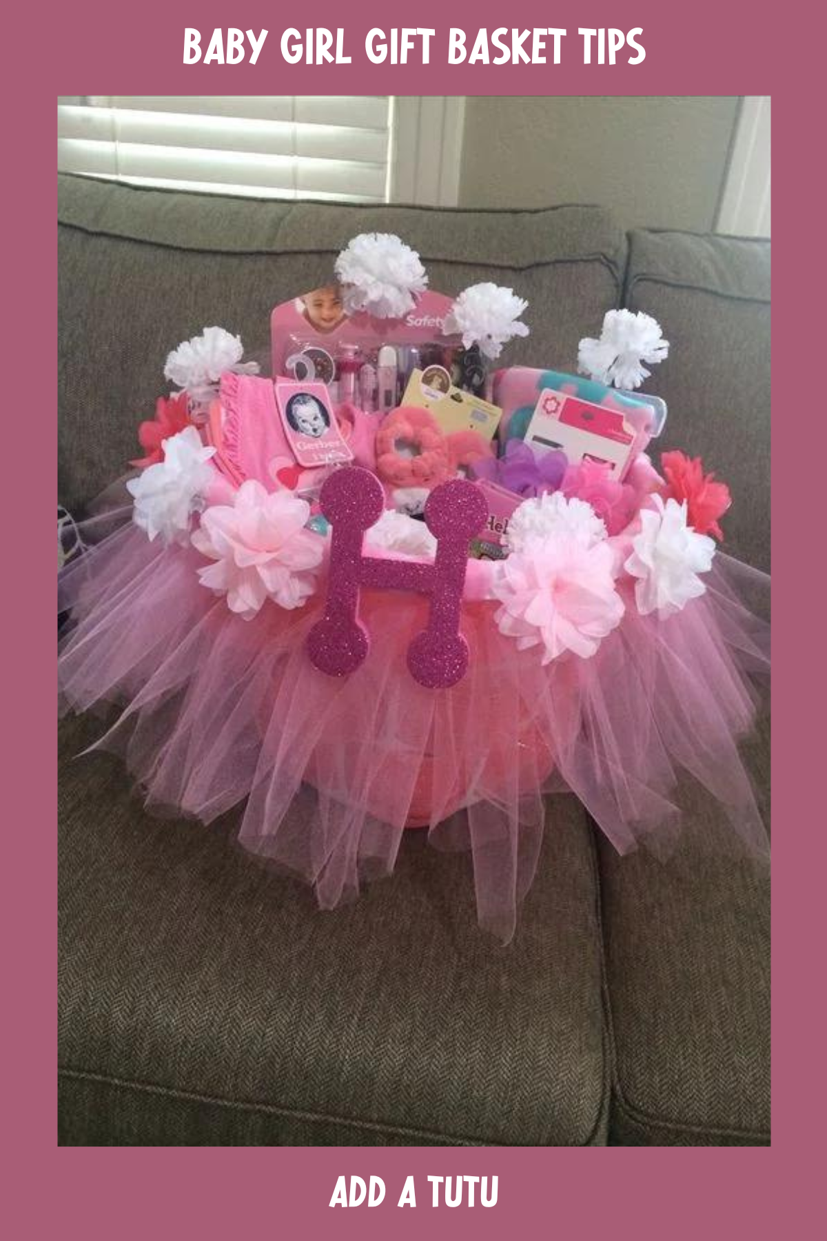 Highlighting an initial "H" in sparkly pink, this tutu-themed basket is bursting with essentials for a little princess. From baby care products to plush toys, it’s a thoughtful and visually stunning gift.