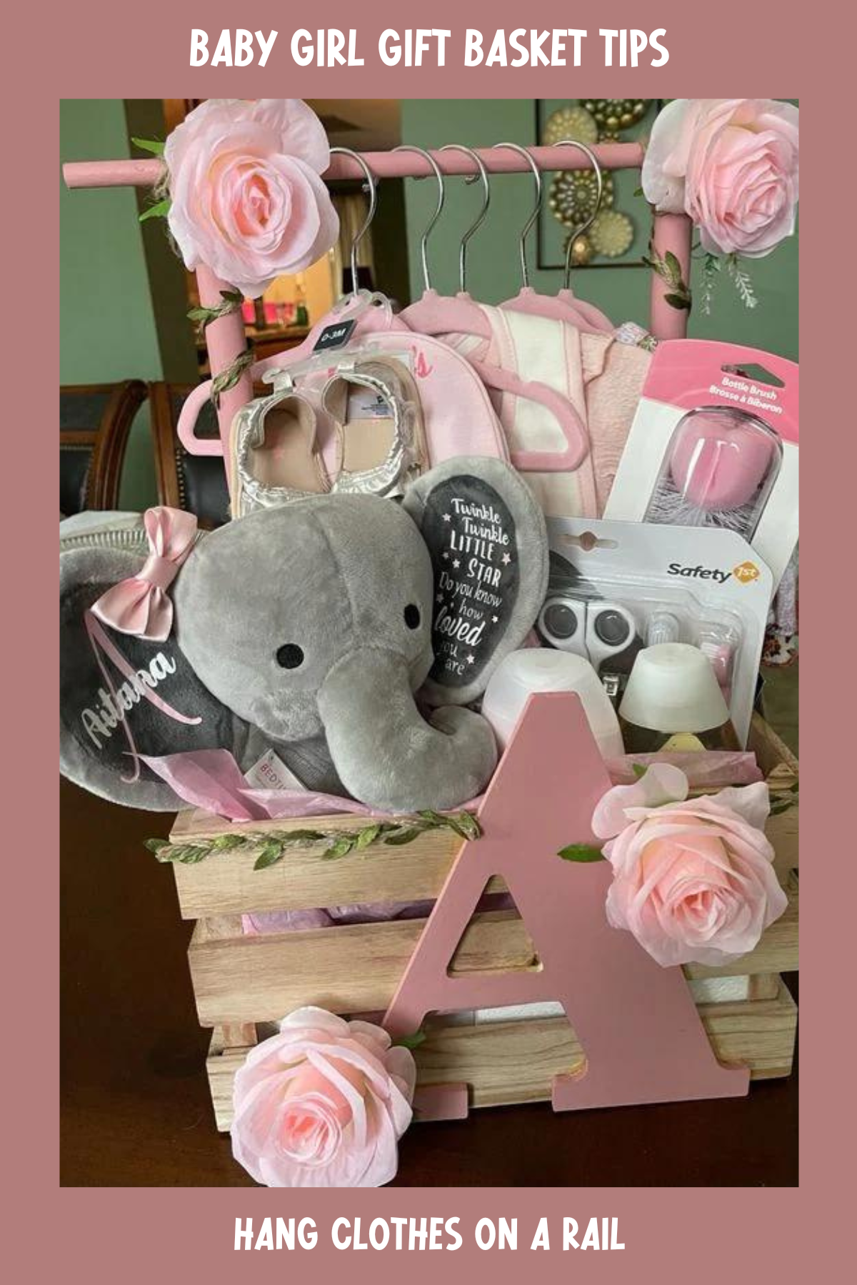 Featuring a mix of baby necessities and personalized elements, this elegant basket stands out with its pastel color scheme. The plush elephant, monogrammed items, and soft floral details make it an adorable yet sophisticated gift for a little princess.