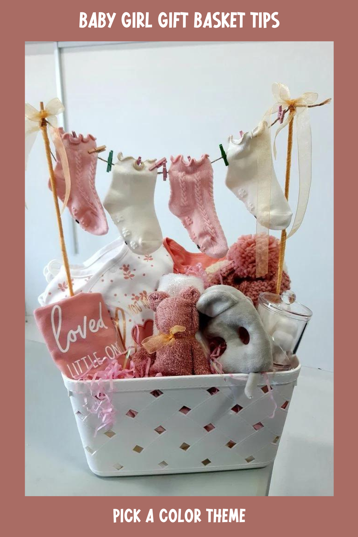 This precious gift basket uses a clever laundry line design to display tiny baby socks, adding a playful touch. Filled with baby clothes, soft toys, and essentials, it's an eye-catching and thoughtful present for any new mom.