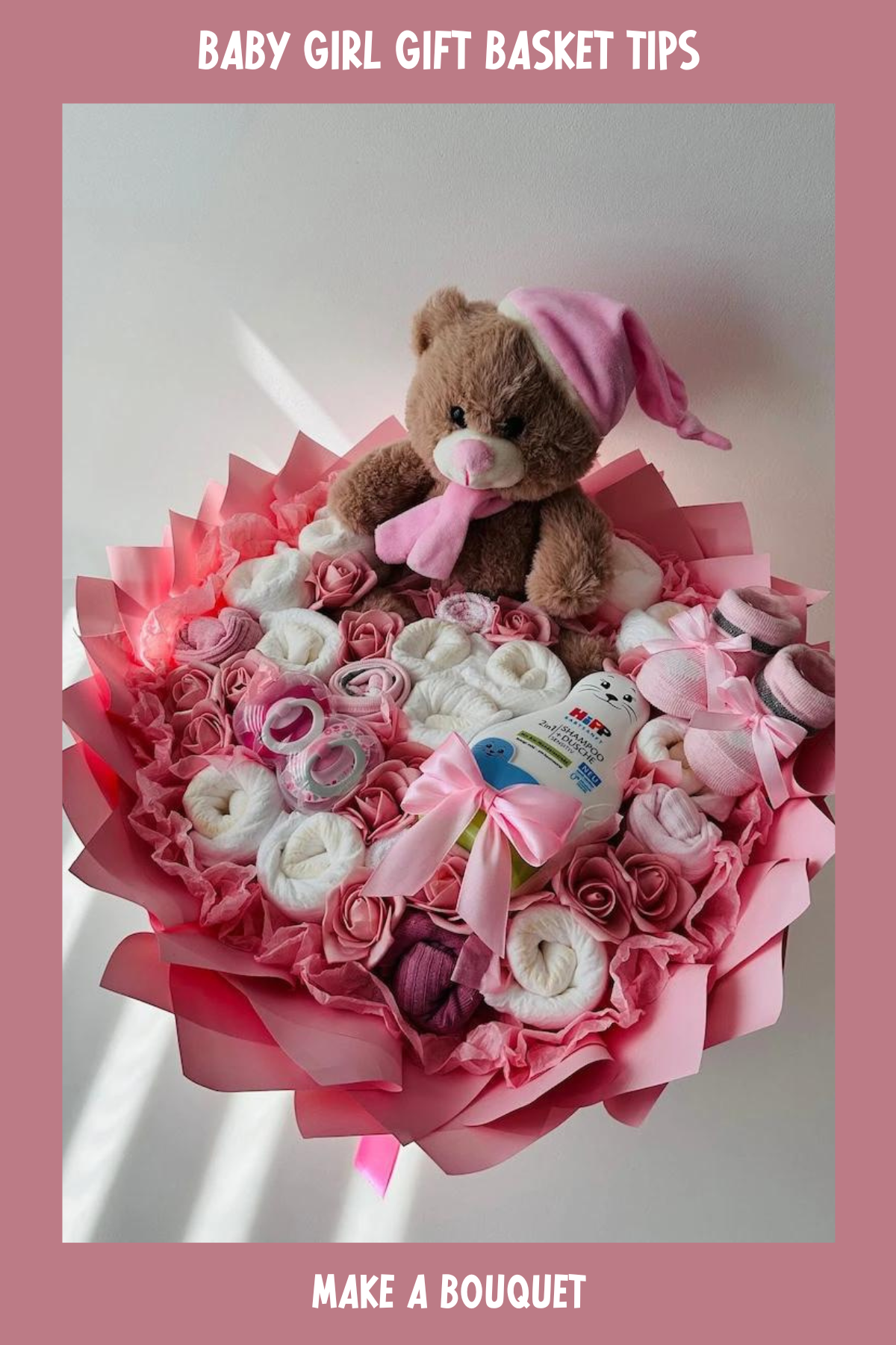 This delightful gift basket features a cuddly teddy bear nestled among soft baby essentials, all arranged beautifully in shades of pink to represent a bouquet. With rolled baby socks, a bottle of baby lotion, and pacifiers, this basket is both practical and adorable—perfect for welcoming a new little one into the world.