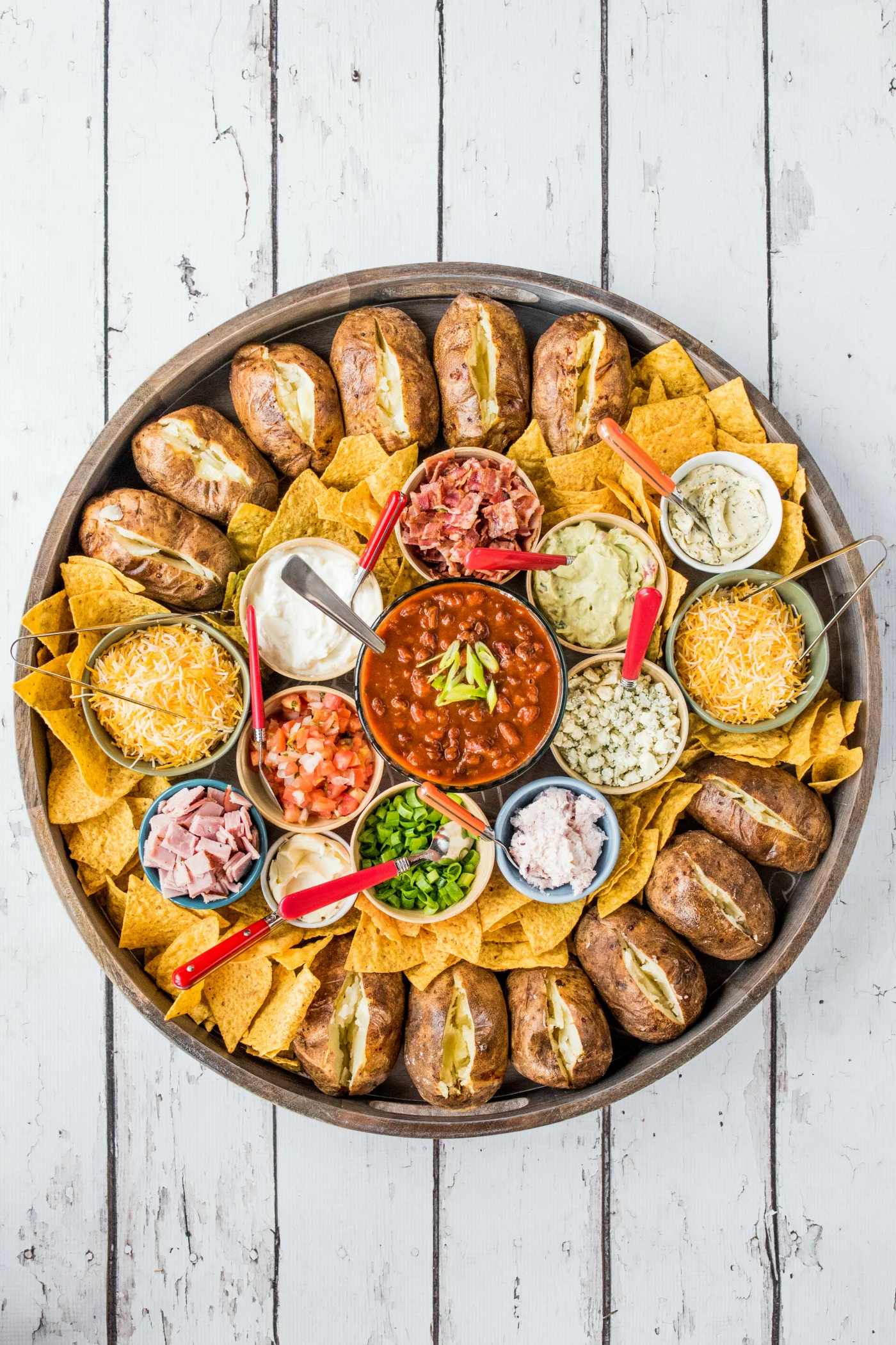 Who doesn’t love a baked potato bar? Set out toppings like chili, cheese, sour cream, and green onions for a fun and customizable family dinner or a relaxed evening with company.