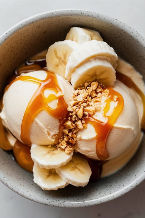 Treat yourself to the refreshing taste of Banana Cream Frozen Yogurt! This easy-to-make dessert combines the natural sweetness of bananas with the creaminess of yogurt, creating a perfect summer delight. Great for family gatherings or solo indulgence! ? #BananaTreats #FrozenDessert