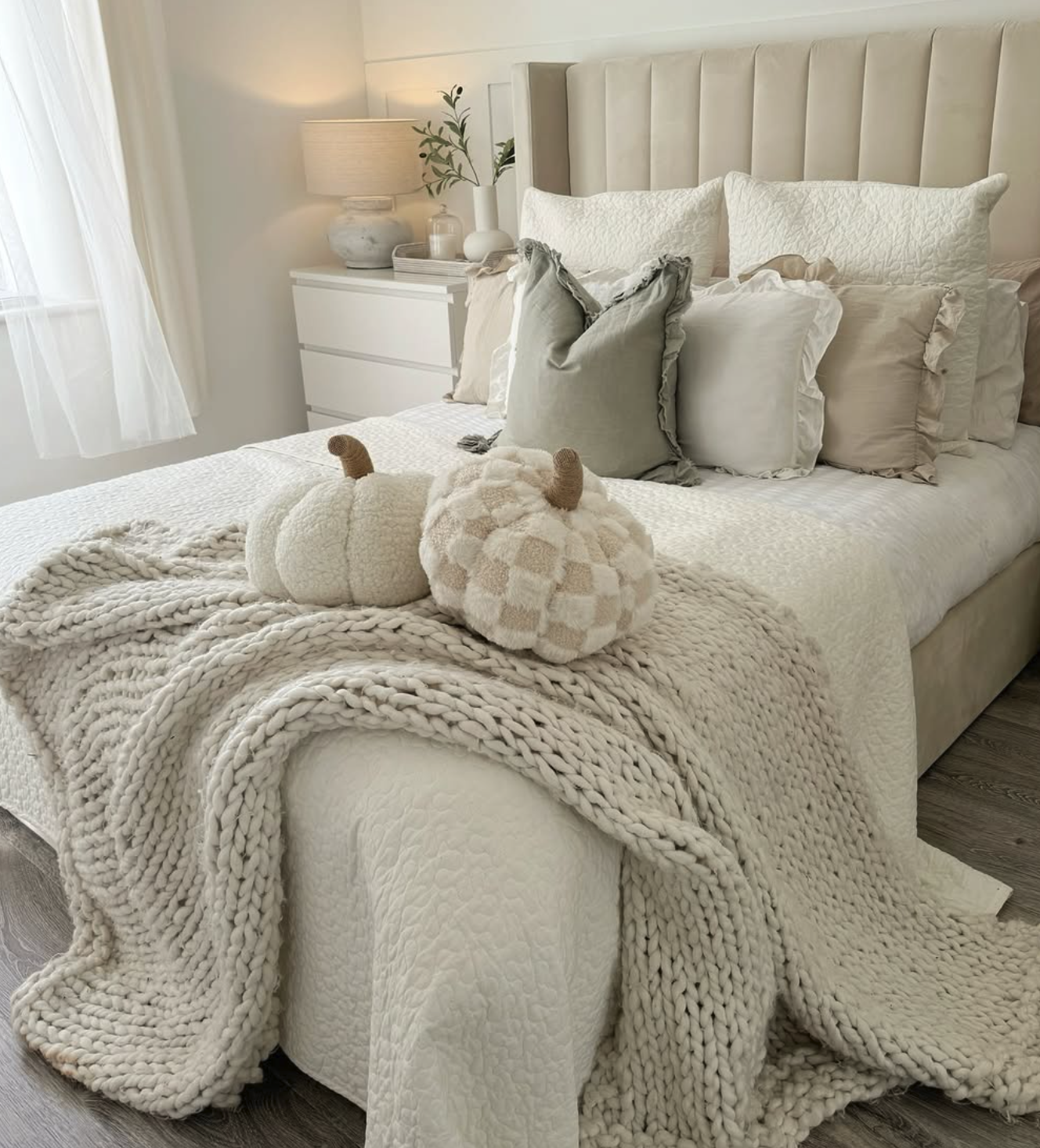 Throws and blankets are the ultimate accessories for a cozy bedroom. Draping a textured throw over the foot of the bed or an accent chair adds instant comfort and warmth.