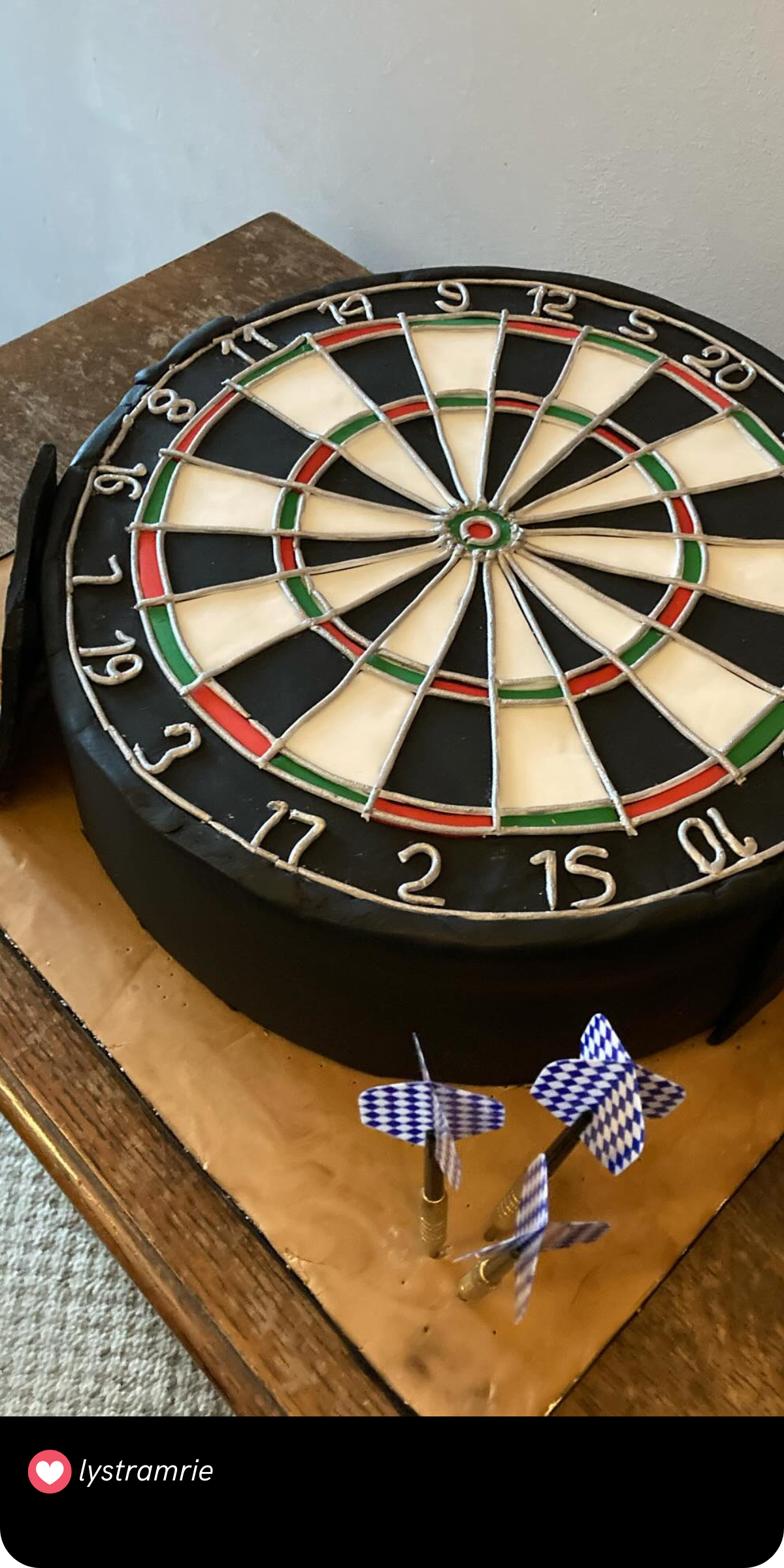 This cake is a bullseye for anyone who enjoys a game of darts! Shaped exactly like a dartboard, complete with scoring rings and little darts on the side, it’s an impressive and unique design. It’s the perfect choice for a guy who’s always up for some friendly competition.