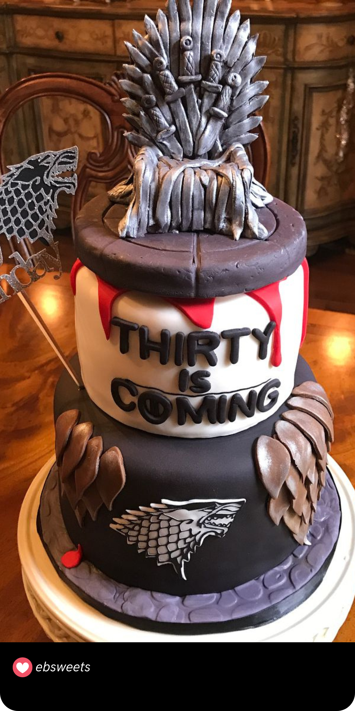 Winter is coming… but in cake form! This "Game of Thrones" inspired cake features the iconic Iron Throne, dripping red fondant, and House Stark sigils. For a fan celebrating their 30th birthday, it’s a regal and dramatic tribute fit for a king.