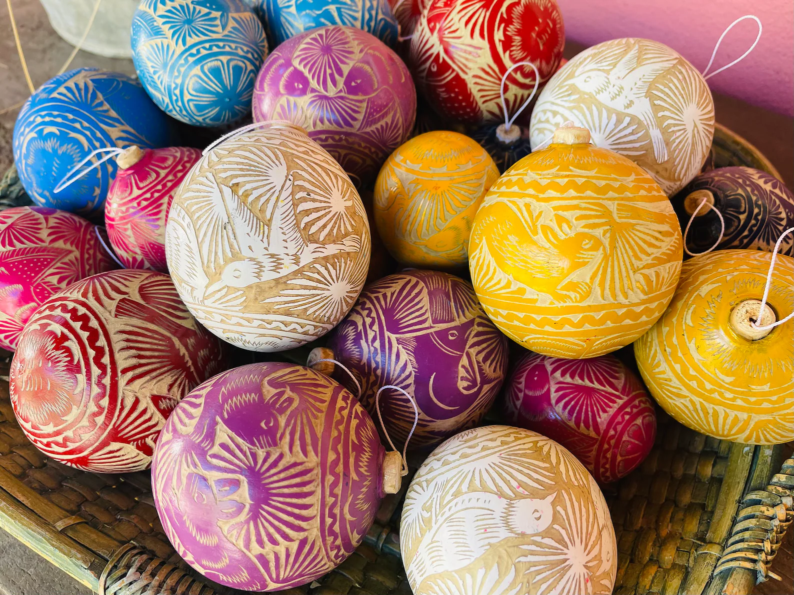 These hand-carved gourd ornaments are pure artisan magic. Each one is crafted from a real gourd, making every piece beautifully unique in shape and shade. The intricate carvings and bold colors bring an earthy, global-inspired touch to your Christmas tree — perfect for anyone who loves meaningful, handcrafted decor. They’re the kind of ornaments that spark conversation and add soul to your holiday setup.