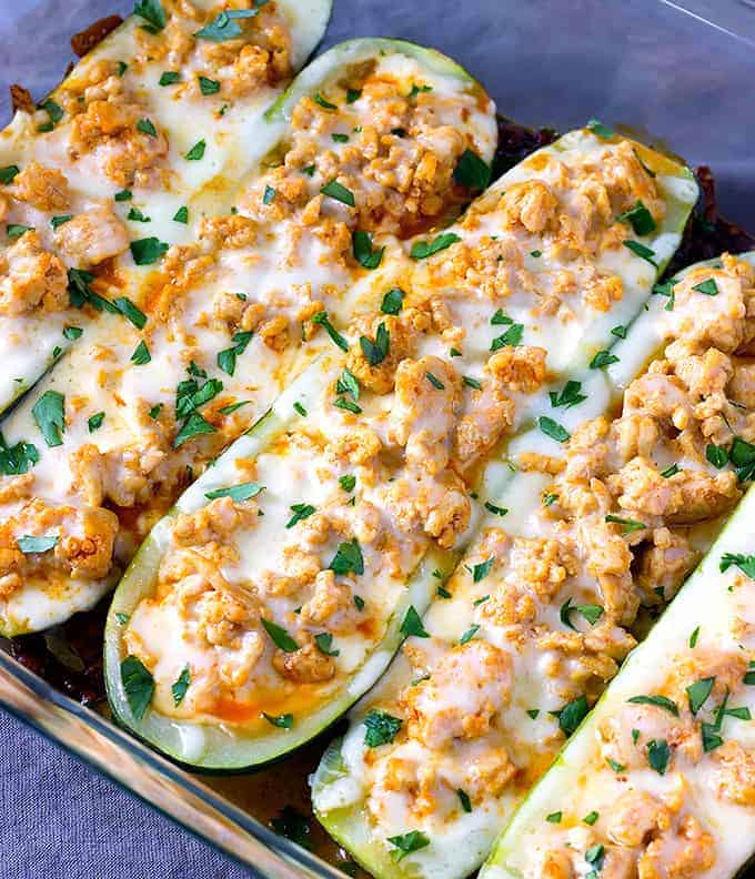 Hollowed-out zucchini halves stuffed with a flavorful buffalo chicken mixture and baked until tender. A fun and low-carb way to enjoy big buffalo flavor.