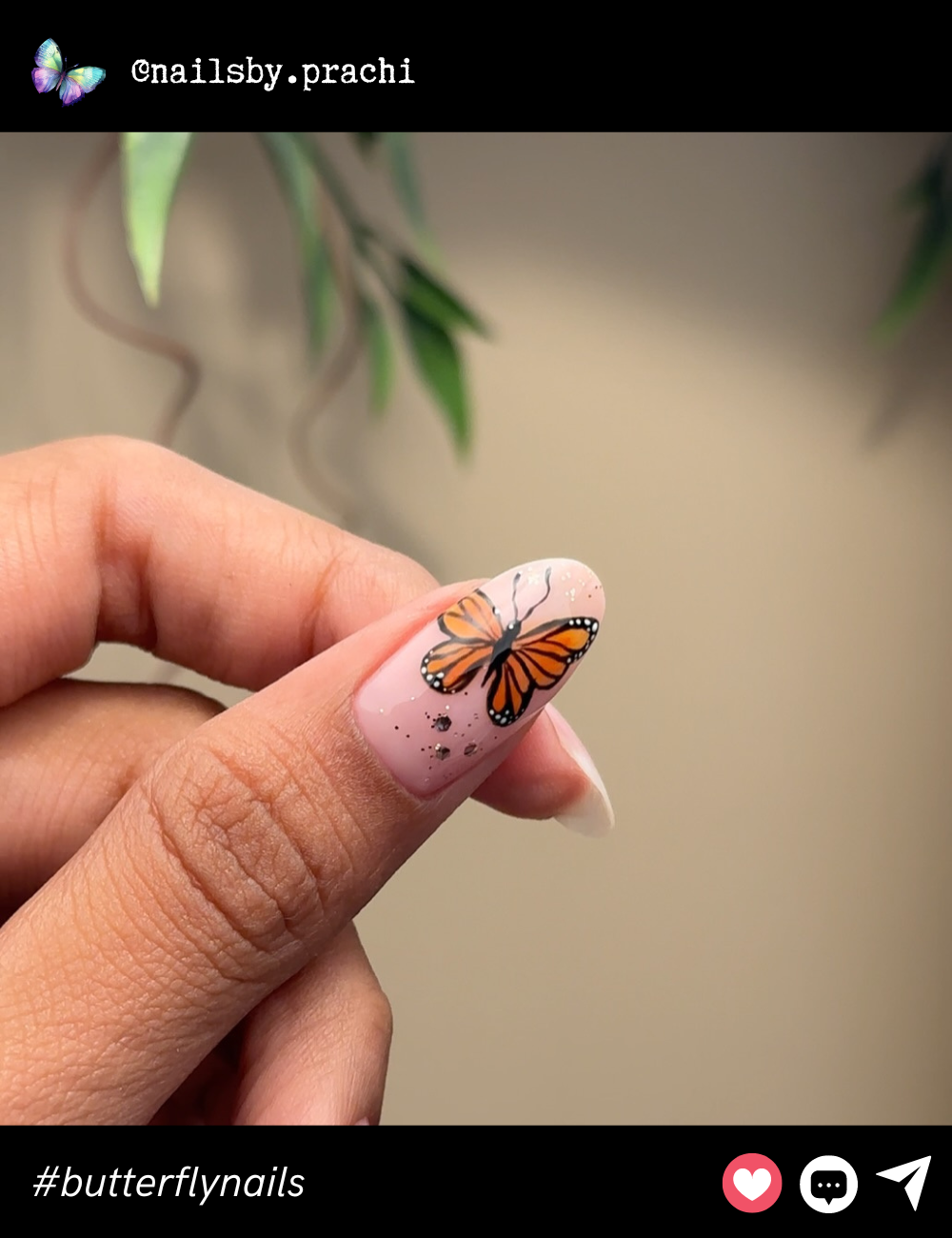 Minimalistic yet detailed, this singular monarch butterfly nail design on a natural base keeps things simple while capturing the essence of beauty in nature.