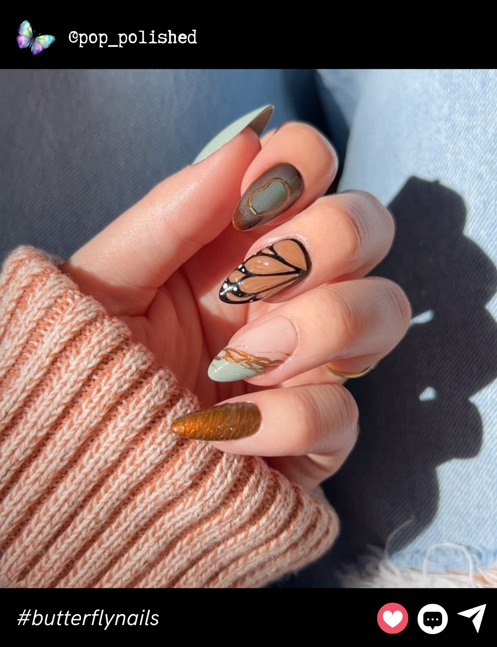 Subtle and sophisticated, this nail art combines soft earthy tones and translucent butterfly wings for a nature-inspired yet chic look.