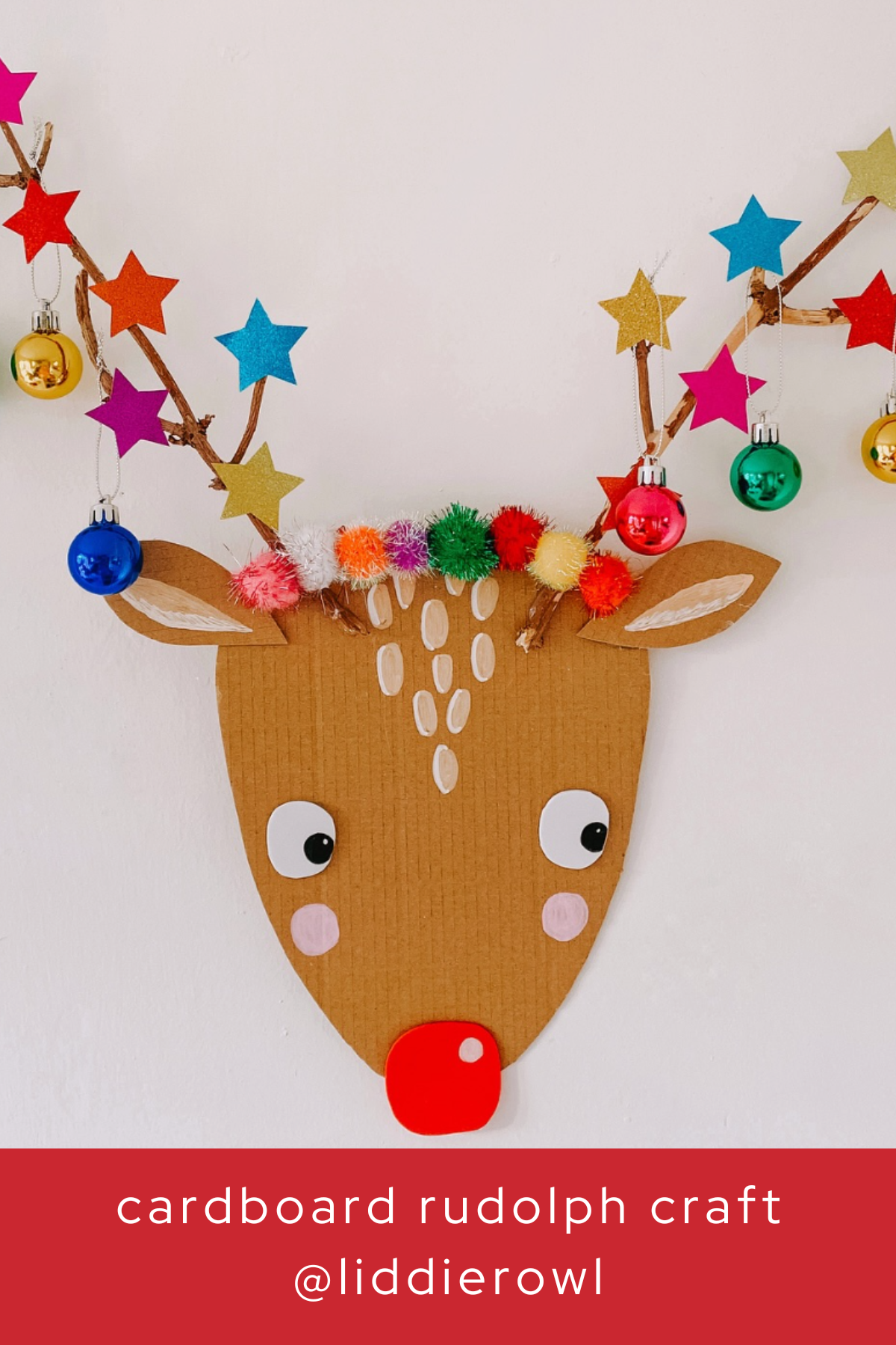 This adorable Rudolph wall decoration is made from cardboard with vibrant, colorful antlers. Festive pom-poms, shiny baubles, and glittery stars make this craft a cheerful addition to any holiday decor.