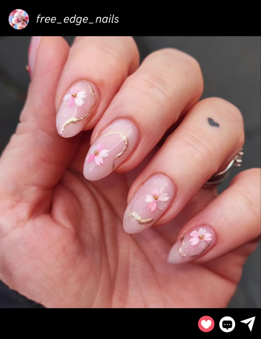 You're about to see cherry blossom nails everywhere thanks to Hailey