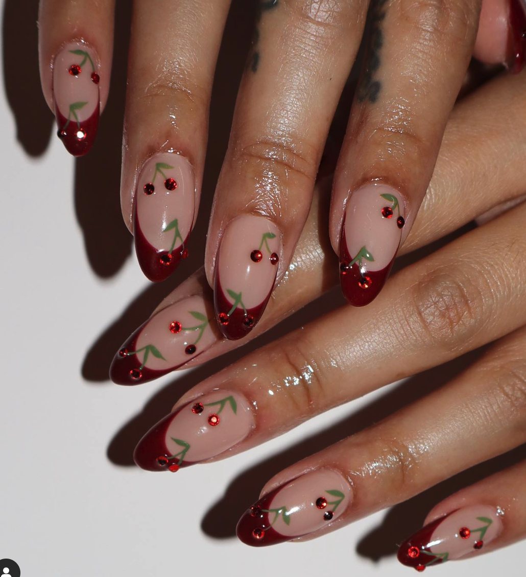 Glamorous Ruby Touch 💅✨: Rich red cherries meet sultry crimson tips—this look is a cherry bomb for sure!