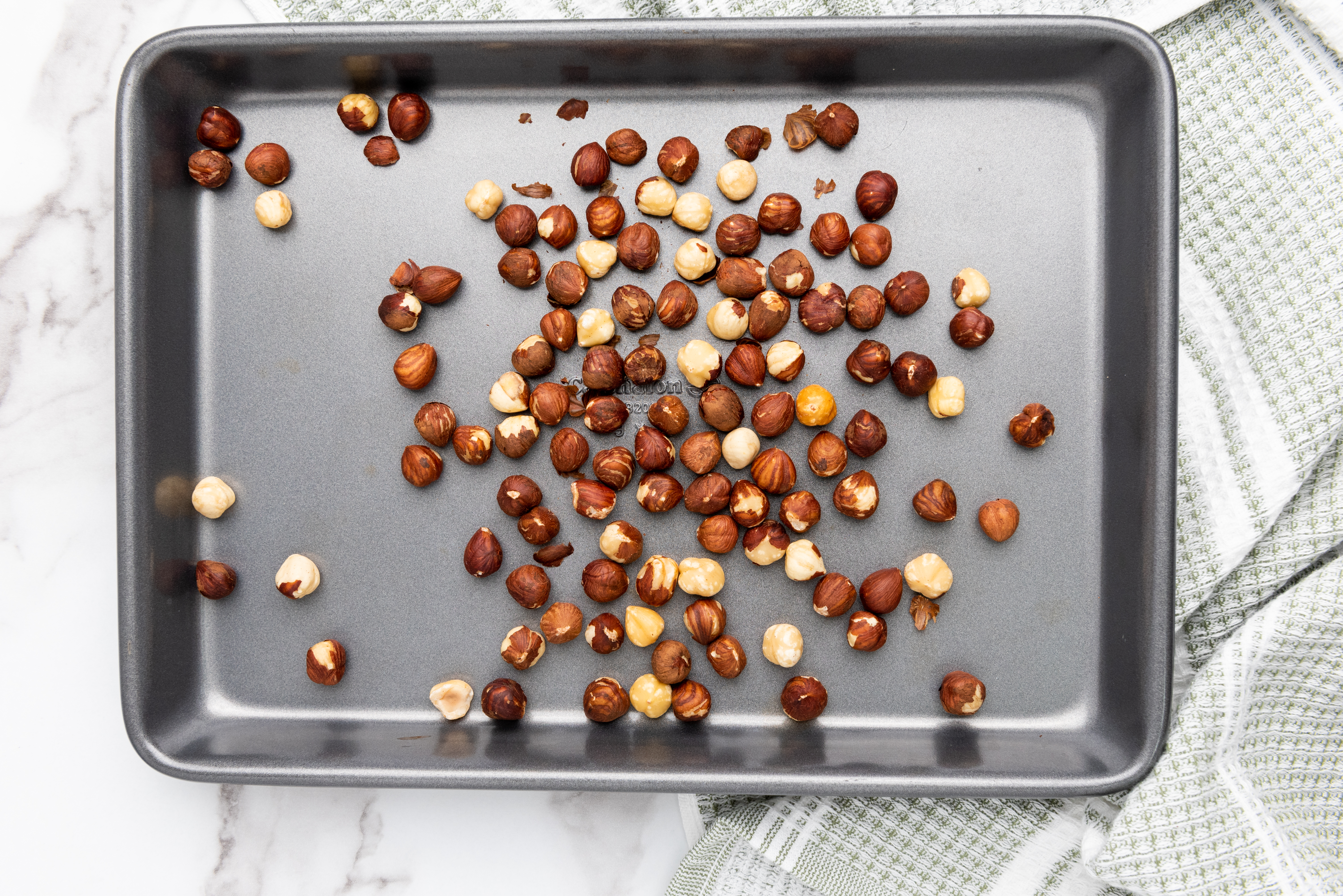 Spread Hazelnuts out on a tray