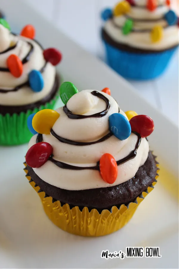 Similar to stringing lights on a tree, these cupcakes feature bright, candy "lights" to give them a festive glow! These are colorful and fun for any holiday party.