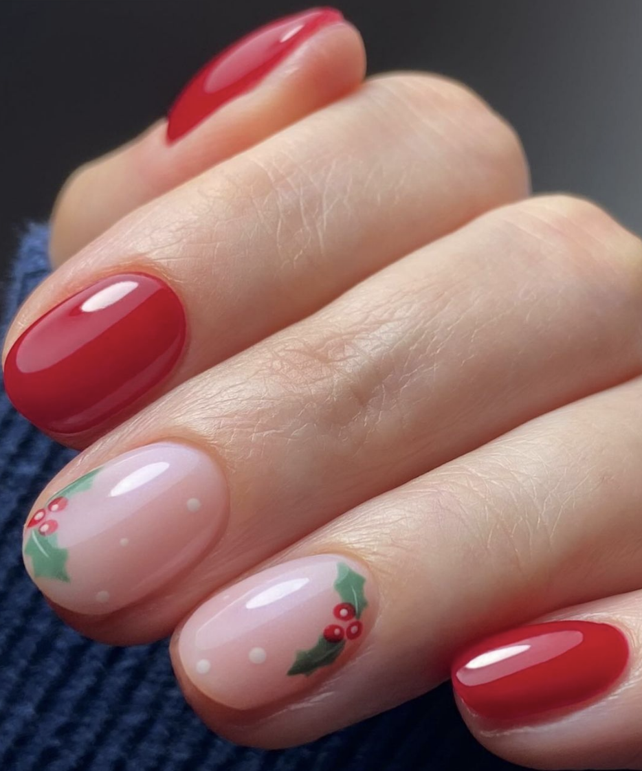 Holly Accents on Nude: A soft nude base with delicate holly berry accents makes for a charming and understated Christmas design. The simplicity of the look is ideal for a subtle holiday touch. @sweetsquared.nails