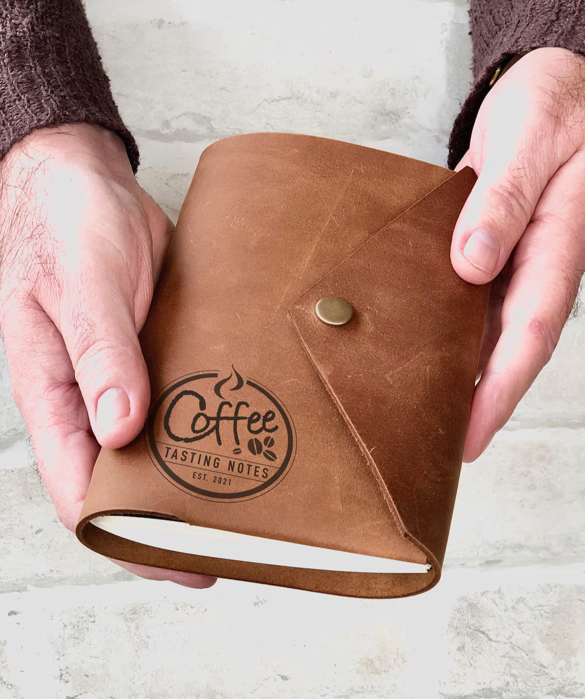 A great gift for the coffee lover in your life! This beautiful handmade leather coffee tasting journal features a flawlessly laser engraved Coffee Notes design (with current year) and comes with the option of adding up to four more personalised engravings! A delight for any coffee addict!