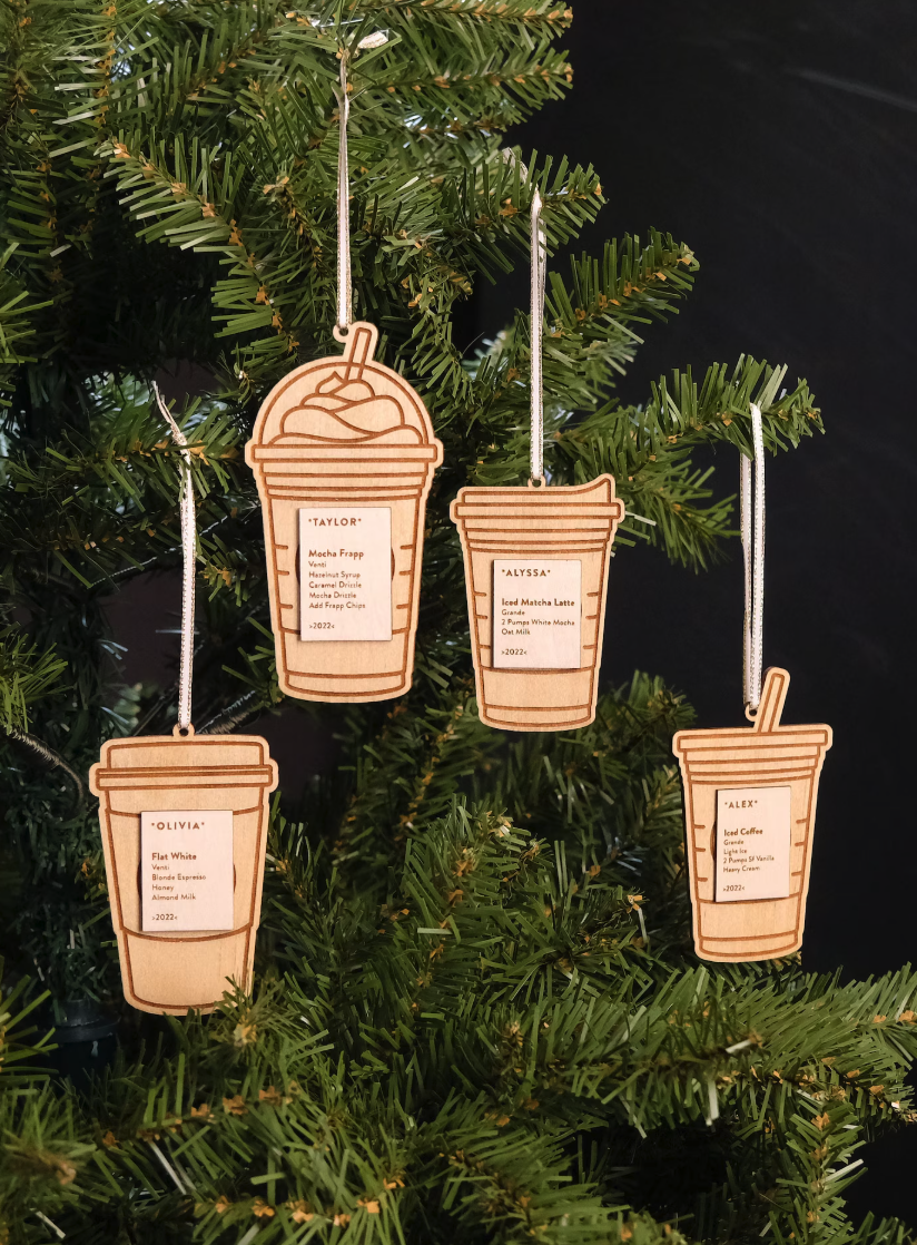 Celebrate your favorite coffee lover this holiday season with a homemade Christmas ornament. These personalized wooden ornaments are laser cut from Baltic Birch and engraved with your custom coffee order.