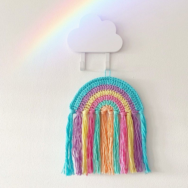 Hang this fabulous rainbow on your wall or in your window to make you smile - the crochet pattern is easy to follow
