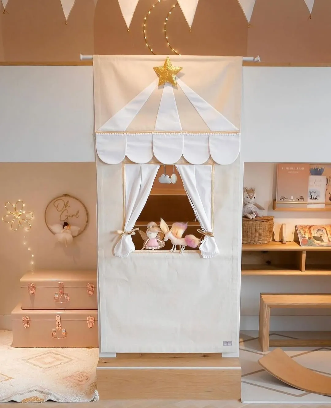 "Magical Puppet Theater" – This elegant little stage invites kids to create their own shows. Bonus points for the soft color palette that blends seamlessly with the rest of the playroom.