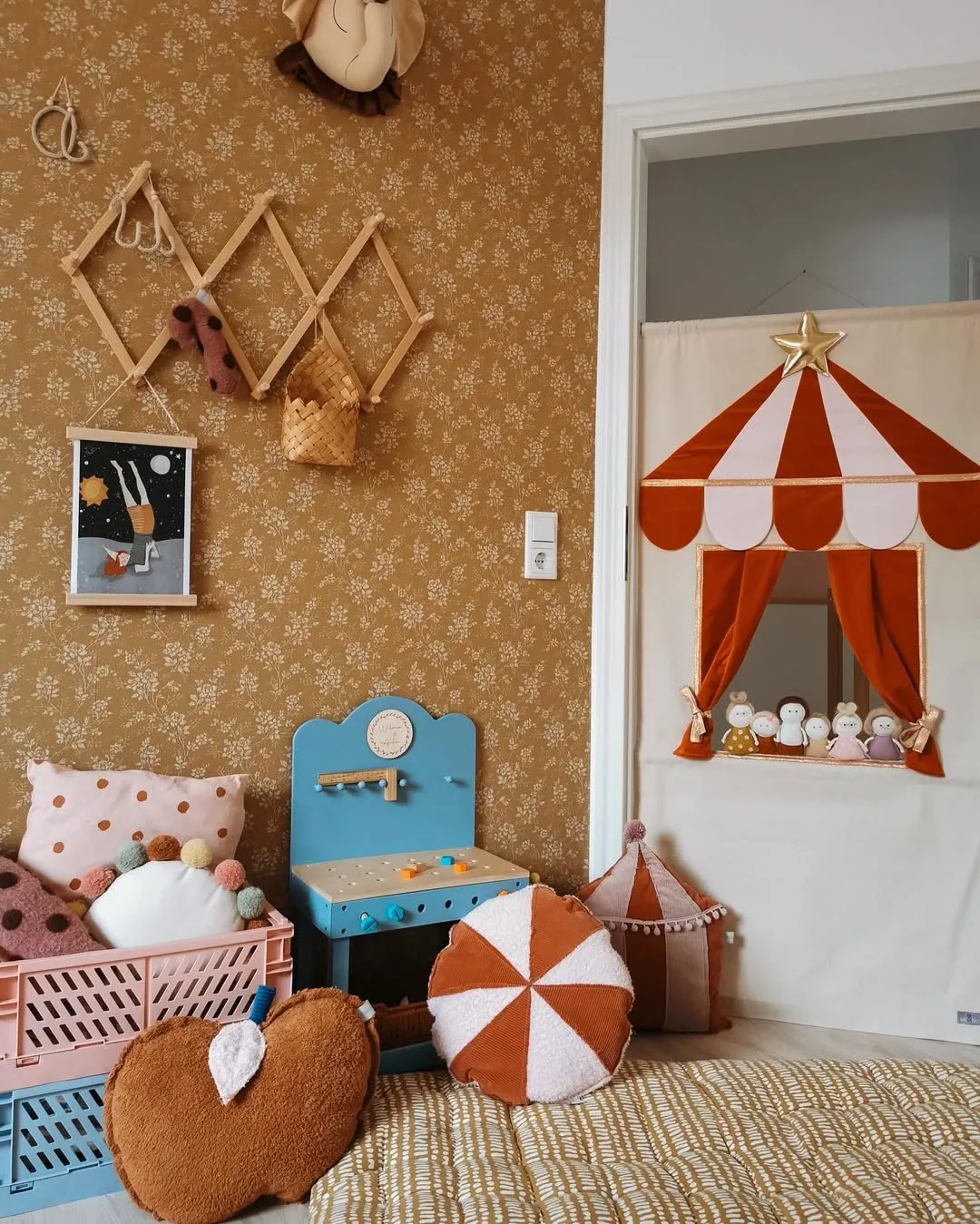 "Under the Big Top" – This whimsical circus-themed corner, complete with a puppet theater and cozy cushions, creates a space for imaginative storytelling and creative play.