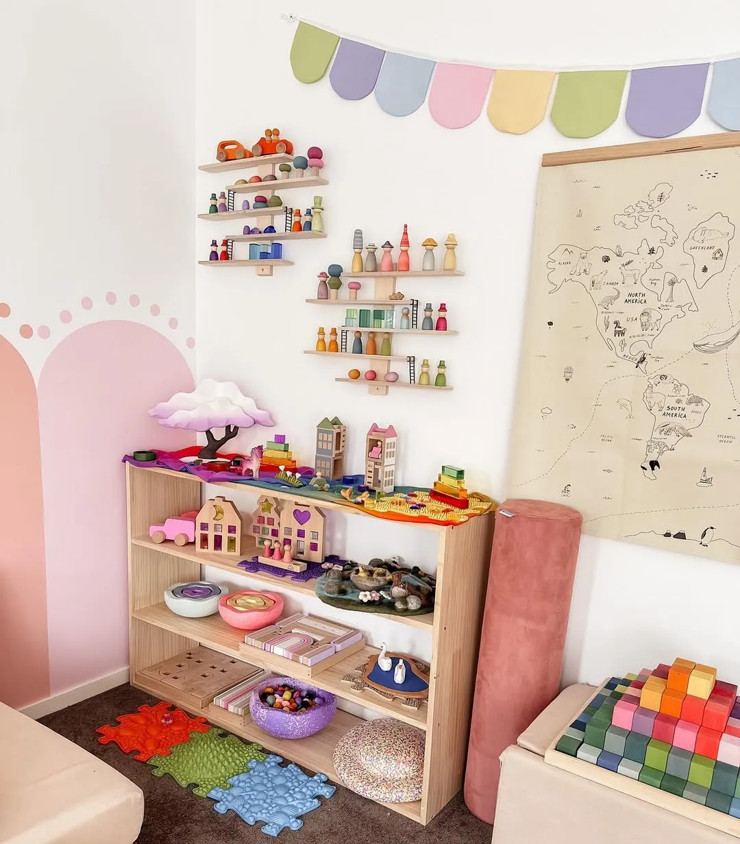 "Rainbow Dreams" – A bright pop of color and organized wooden toys make this play area cheerful and functional. Ideal for creating a happy, stimulating environment!