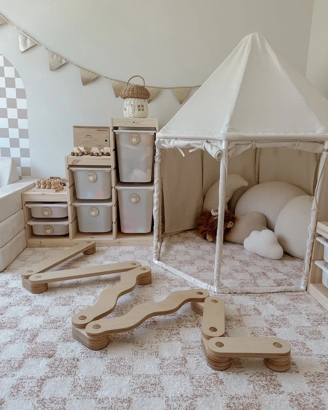 "A Calm Retreat" – A soft, neutral play tent creates the ultimate cozy nook for reading or quiet time. Pair it with storage bins to keep everything tidy!