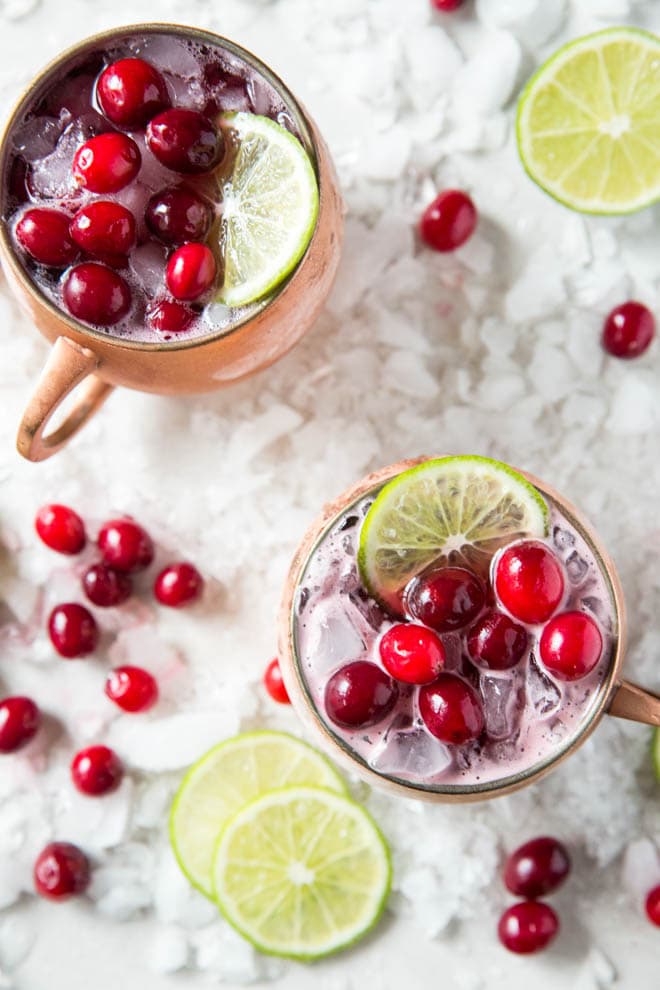 This holiday take on the beloved Moscow Mule combines vodka, ginger beer, lime, and cranberry juice for a refreshing and festive drink.