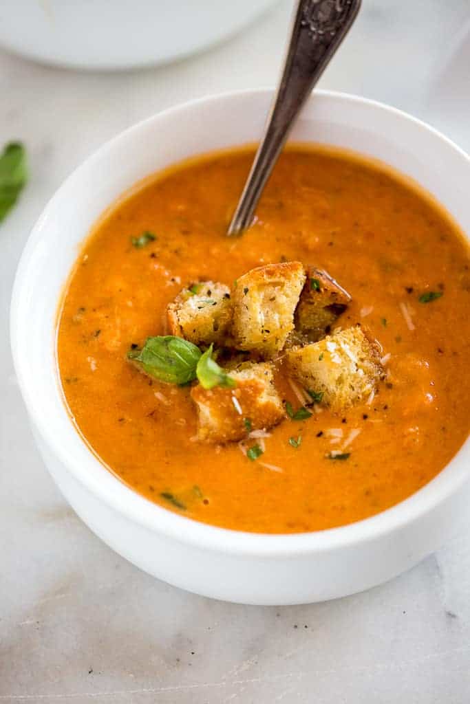 Creamy Tomato Basil Soup: Quick, easy, and oh-so-satisfying, this soup pairs beautifully with a golden, gooey grilled cheese sandwich. It’s a weeknight lifesaver.