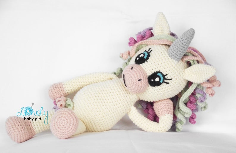 This sweet unicorn crochet pattern is available to get so you can make one for your child today!