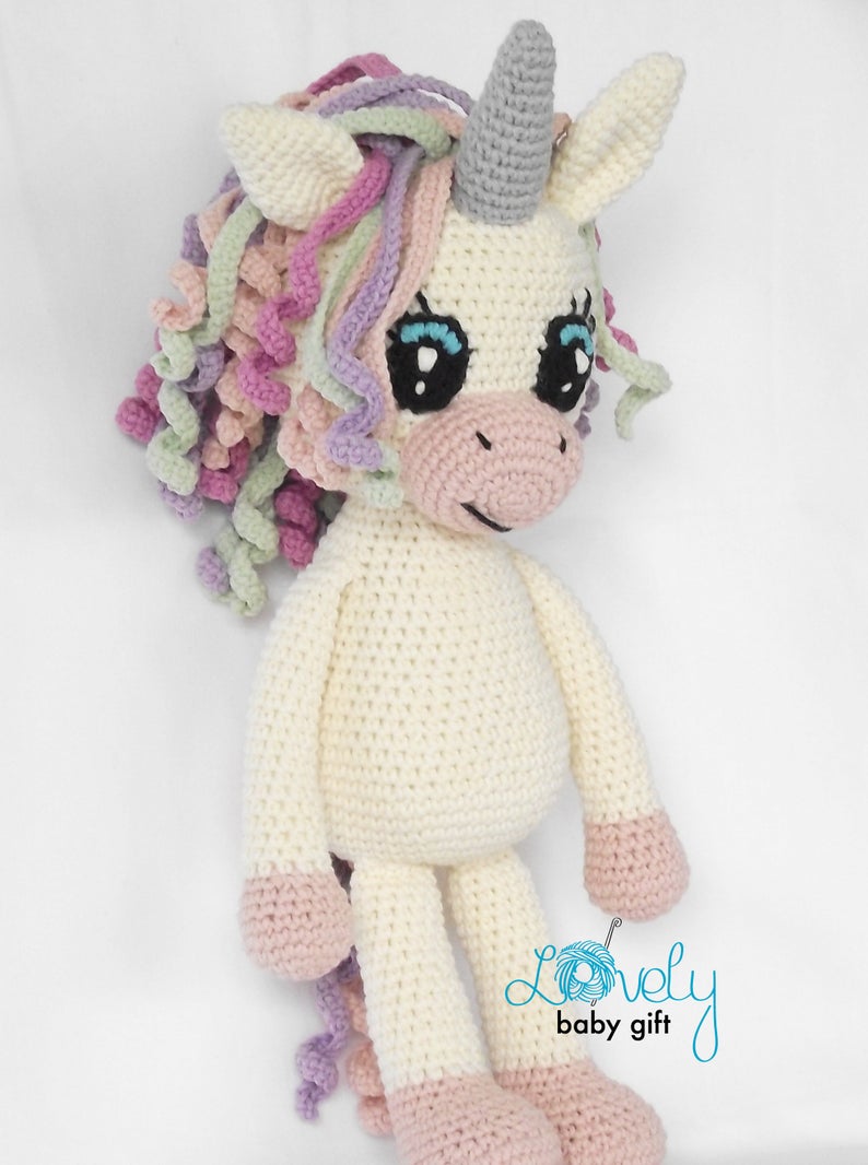 Don't miss this easy to follow crochet pattern to make a sweet unicorn toy any child will love to play with