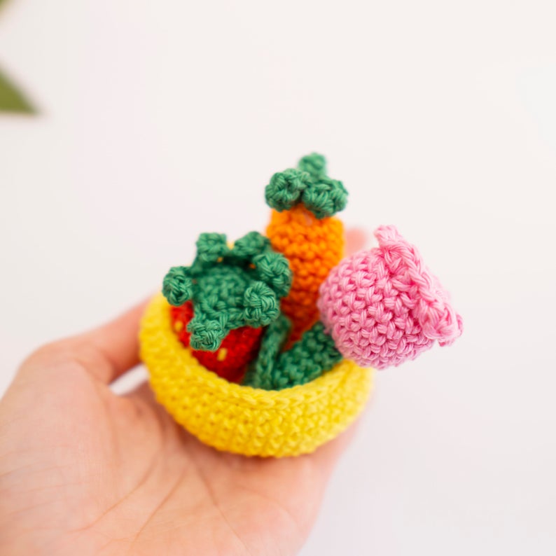 As well as the bunny you can also crochet a carrot, strawberry and a flower for her to carry in her basket.