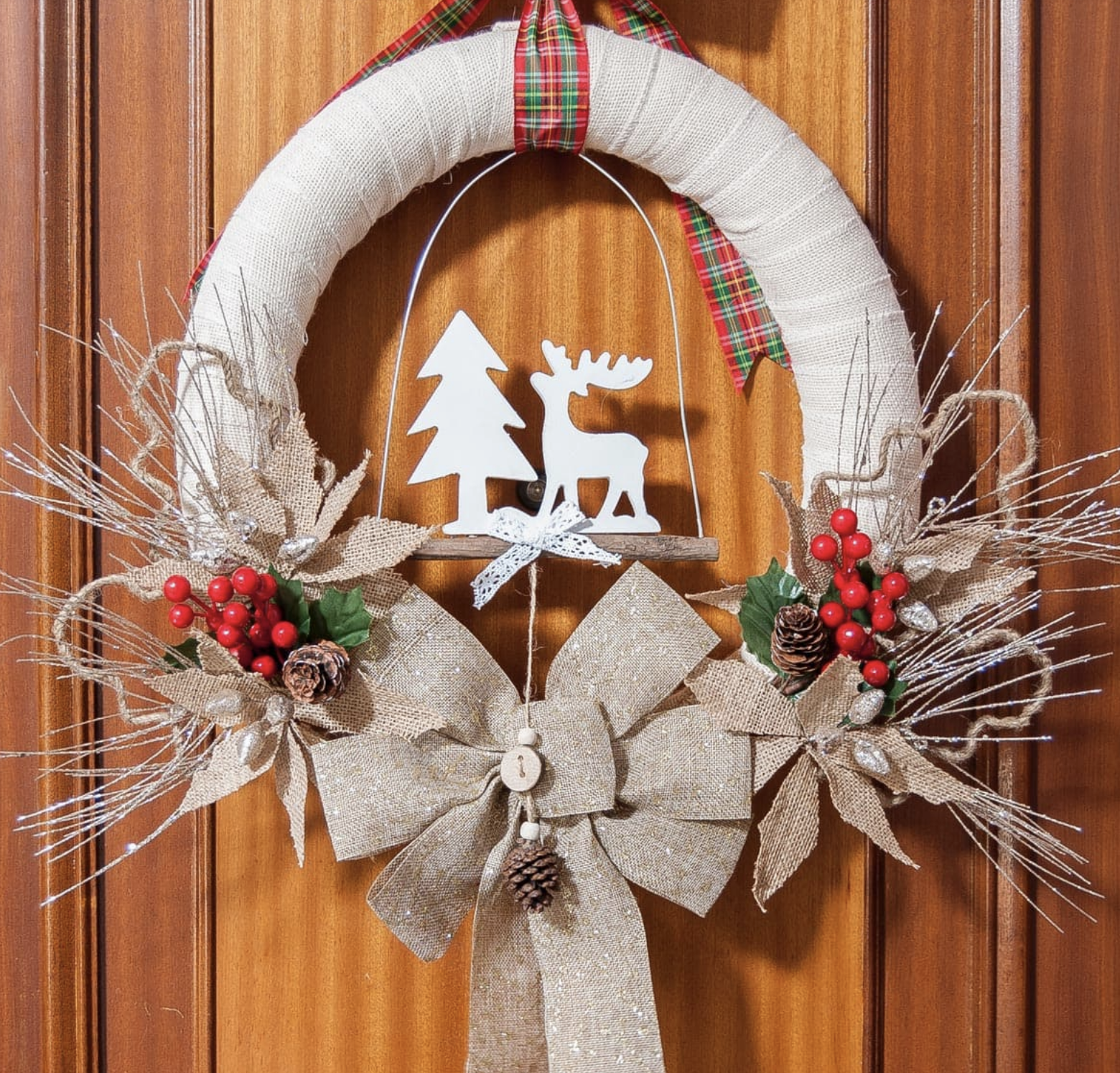 For a truly rustic holiday look, this burlap wreath brings charm and warmth to any entryway. Made with simple materials, it’s as budget-friendly as it is beautiful. Make your own.