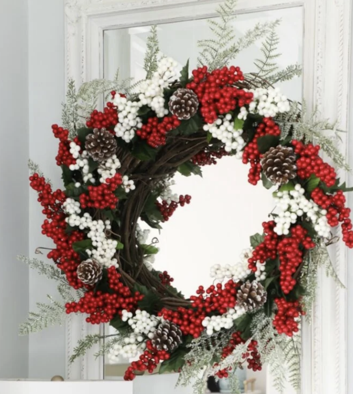 Red berries are a classic holiday touch, and this Dollar Store wreath combines them beautifully with greenery. A perfect traditional holiday accent! Try it here.