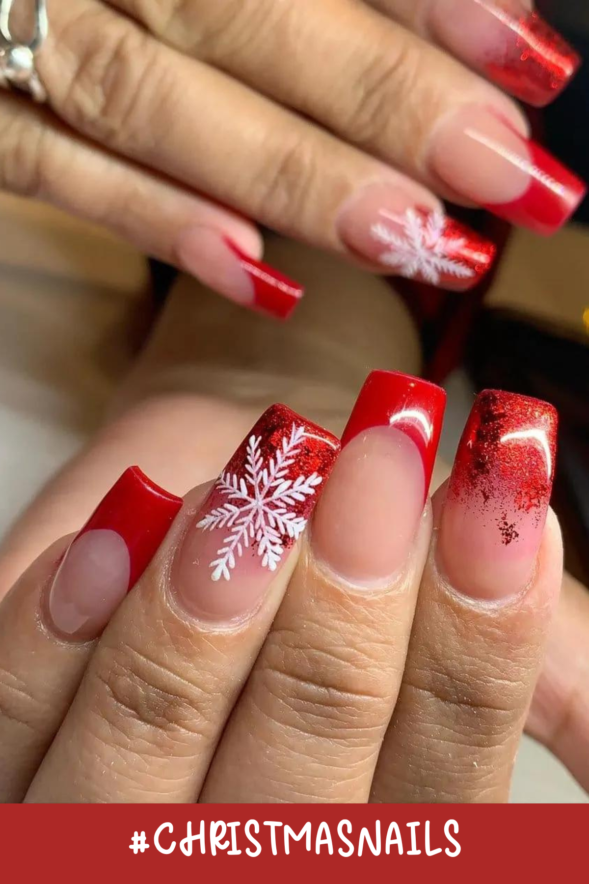 These nails scream Christmas elegance! The deep red base with glittery tips creates a glamorous vibe, while the white snowflake accent adds a touch of winter wonder. Perfect for that holiday party!