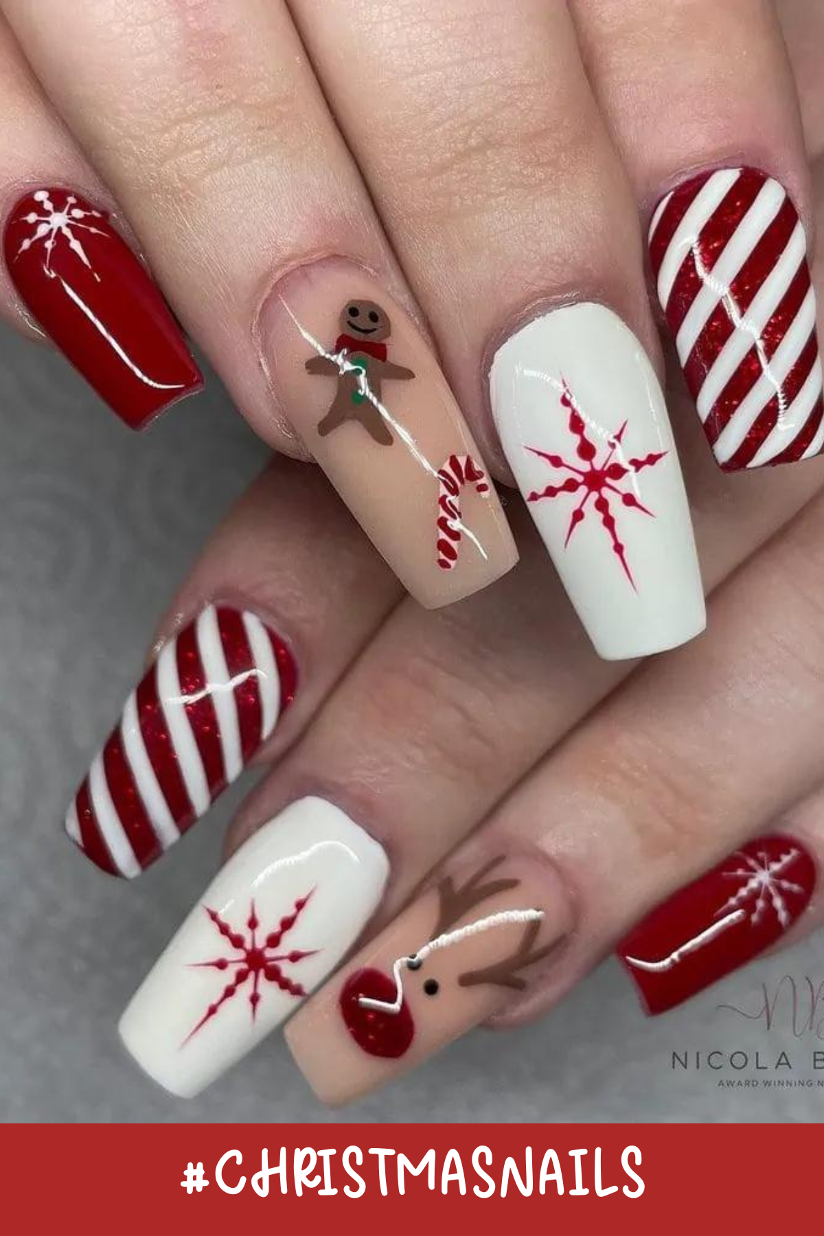 Classic holiday vibes with a twist! The candy cane stripes, gingerbread men, snowflakes, and reindeer motifs are so festive, while the mix of red, white, and nude tones adds a modern touch. These nails are holiday-ready in the most stylish way!