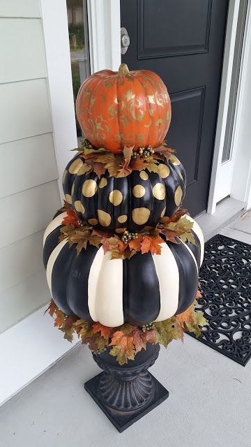 Dollar Store pumpkins painted and studded with thumbtacks