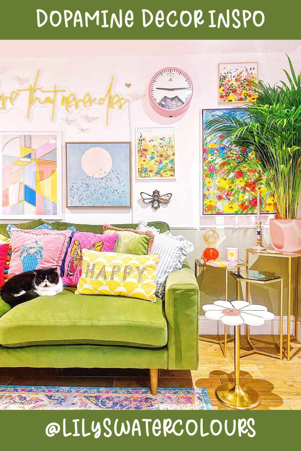 @LILYSWATERCOLOURSWelcome to a color lover’s paradise! 🌈 This space is filled with joyful accents – from the lime green couch layered with vibrant pillows to the art-covered wall. The eclectic mix of artwork, plants, and cheerful accessories make it an oasis of happiness (with a little help from that chill cat)!