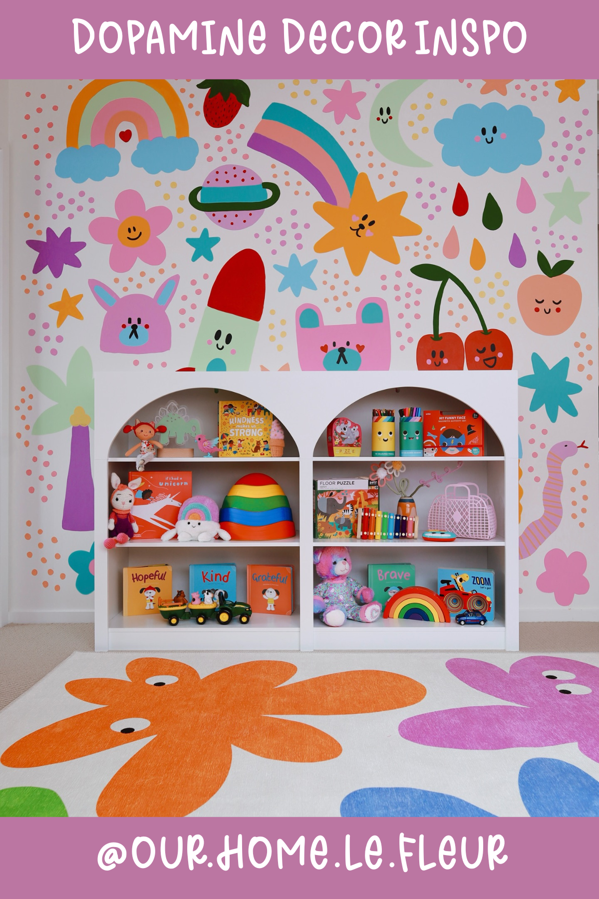 @OUR.HOME.LE.FLEURA magical playroom dream! 🌟 With its colorful mural of rainbows, stars, and cute characters, this wall brings joy to life. The pop of orange and purple on the rug ties the whole space together, turning a simple storage nook into a vibrant, playful wonderland.