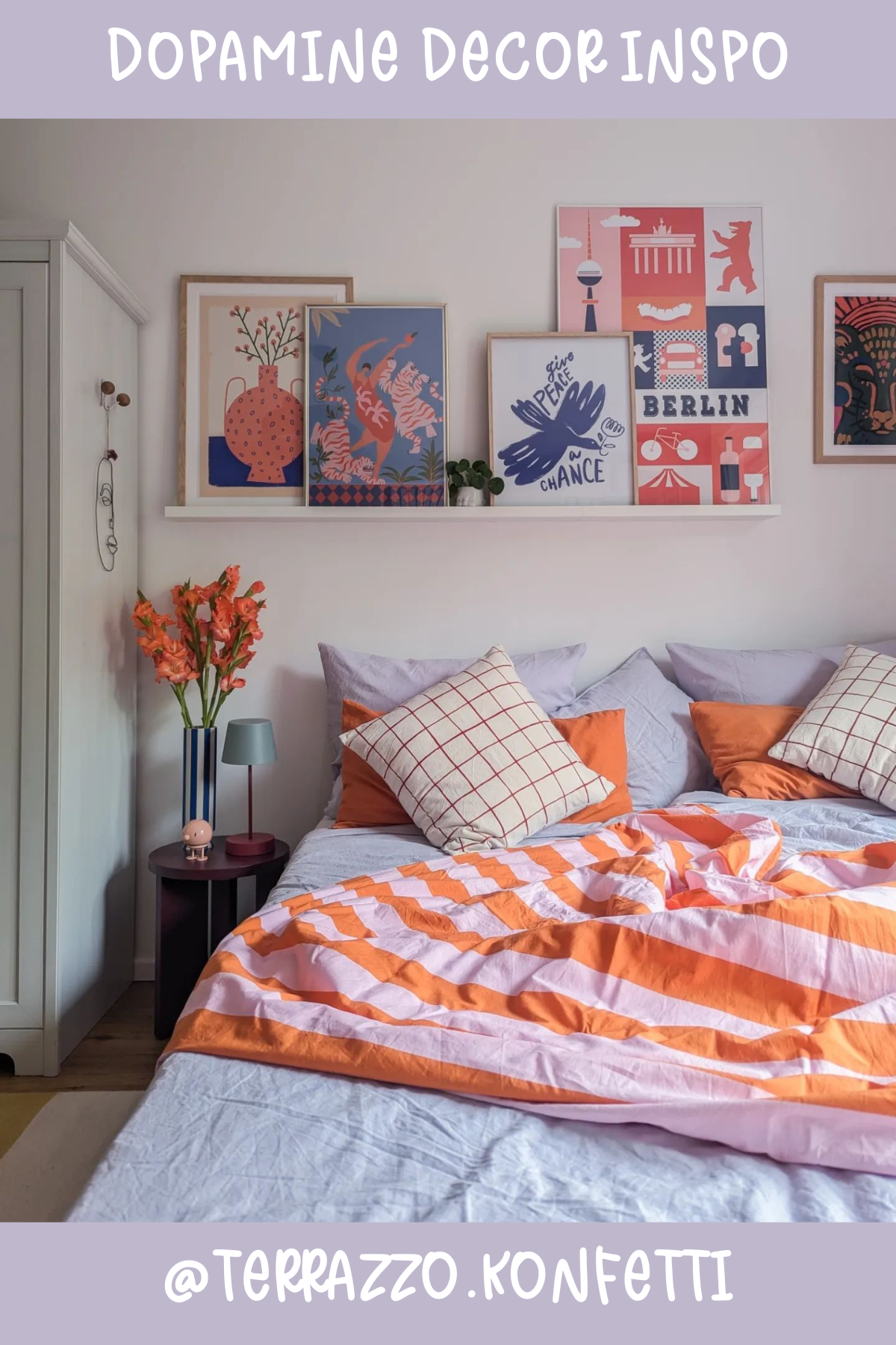 @TERRAZZO.KONFETTISleep in style with a bold splash of orange and pink! 🧡 The geometric patterns and vibrant bedspread make this bedroom feel so lively. Art prints above the bed create an inspiring, gallery-like vibe – perfect for injecting a bit of creative energy into your day.