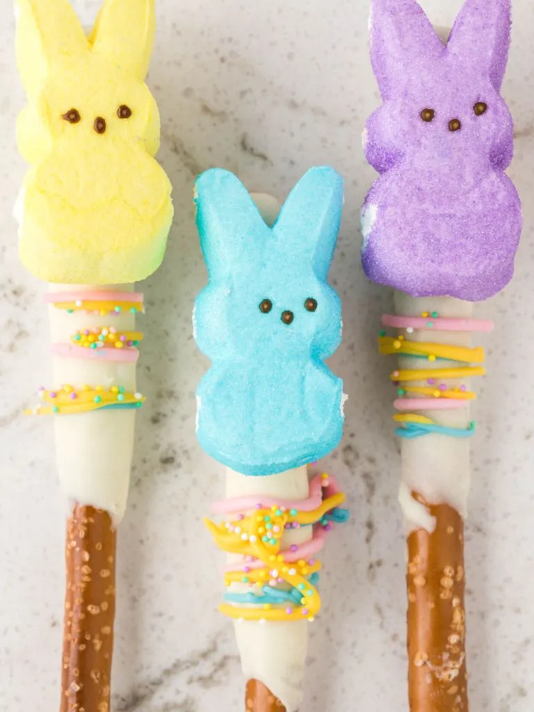 These pretzel rods are dipped in colorful candy melts and topped with Peeps for a fun Easter treat. They’re quick to make and perfect for kids or as a fundraiser favorite!