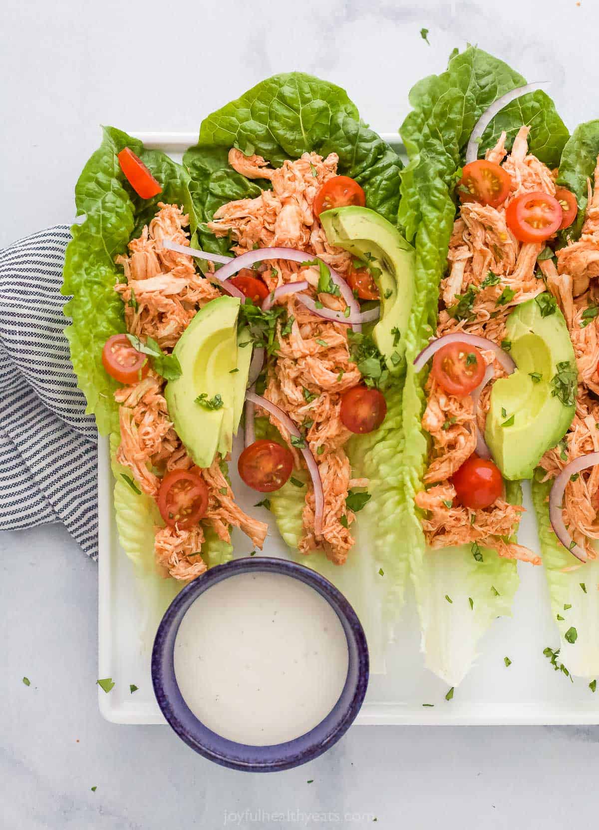 Crispy romaine or butter lettuce wraps are the perfect low-carb vehicle for juicy buffalo chicken. Add shredded carrots, celery, and a drizzle of light ranch for the ultimate handheld bite.