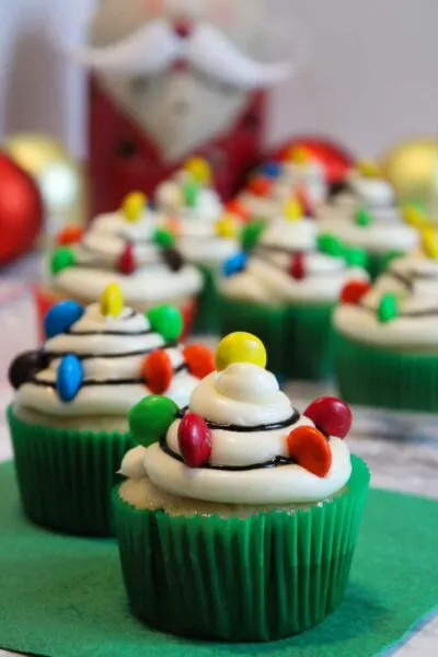 Light up your holiday spread with these fun Christmas light cupcakes! The colorful candy decorations on these cupcakes will make them the star of your party.