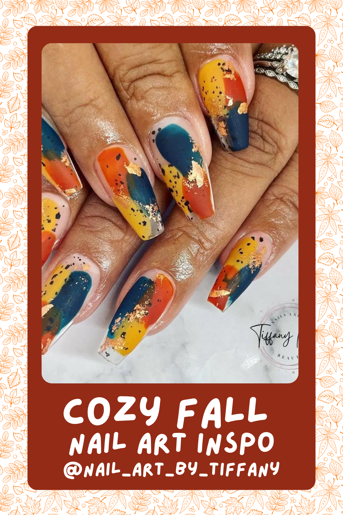 @nail_art_by_tiffanyBold autumn colors collide in this abstract design with splashes of gold foil for a luxe finish that screams fall fashion.