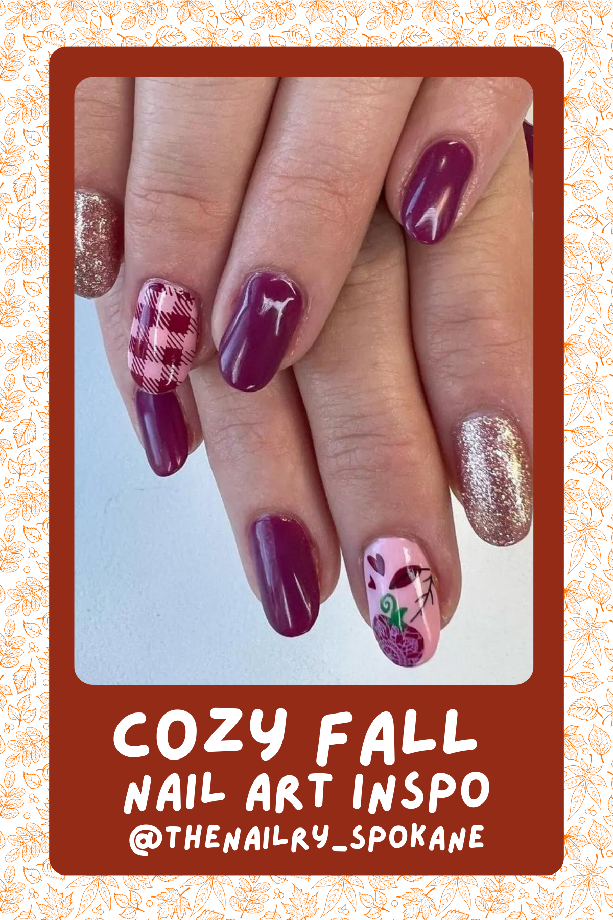 @thenailry_spokane: Bring out your inner cozy girl with this mix of plum tones, plaid patterns, and sparkly accents. The soft pink with floral details adds a sweet touch to this autumn-ready look! 💜🧣